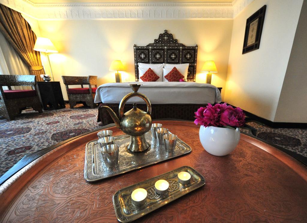Regency Palace Амман Экстерьер фото A room at the hotel